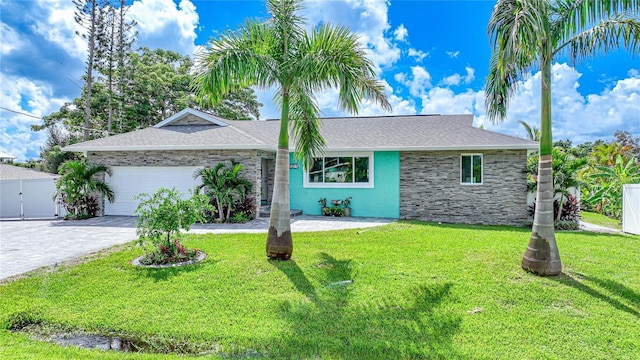 192 Danforth Dr S, Port Charlotte, FL 33980 - single story home with stone siding, an attached garage, decorative driveway, and roof with shingles