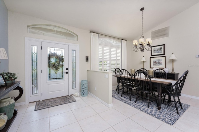 4443 Abcor Rd, North Port, FL 34286 - foyer featuring a chandelier, vaulted ceiling, and light tile patterned floors