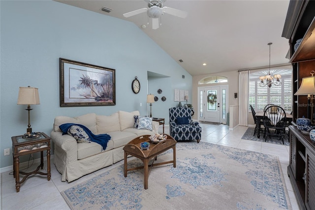 4443 Abcor Rd, North Port, FL 34286 - living room featuring a chandelier, light tile patterned floors, a ceiling fan, and high vaulted ceiling
