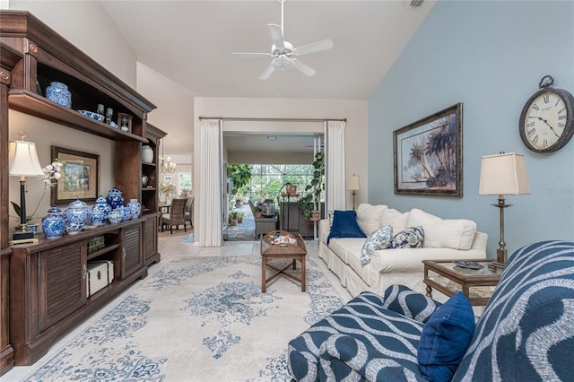 4443 Abcor Rd, North Port, FL 34286 - living area with a ceiling fan, vaulted ceiling, and light tile patterned floors