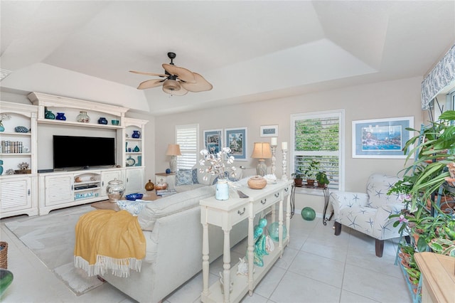 4443 Abcor Rd, North Port, FL 34286 - living room featuring a raised ceiling, a ceiling fan, plenty of natural light, and tile patterned floors