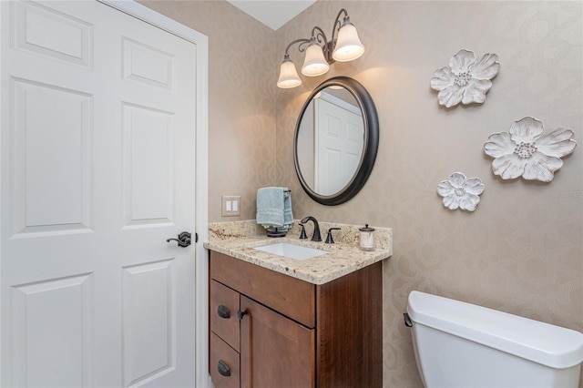 4443 Abcor Rd, North Port, FL 34286 - bathroom with wallpapered walls and vanity