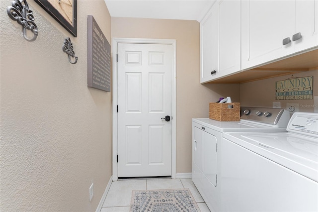 4443 Abcor Rd, North Port, FL 34286 - laundry area with separate washer and dryer, cabinet space, and light tile patterned flooring