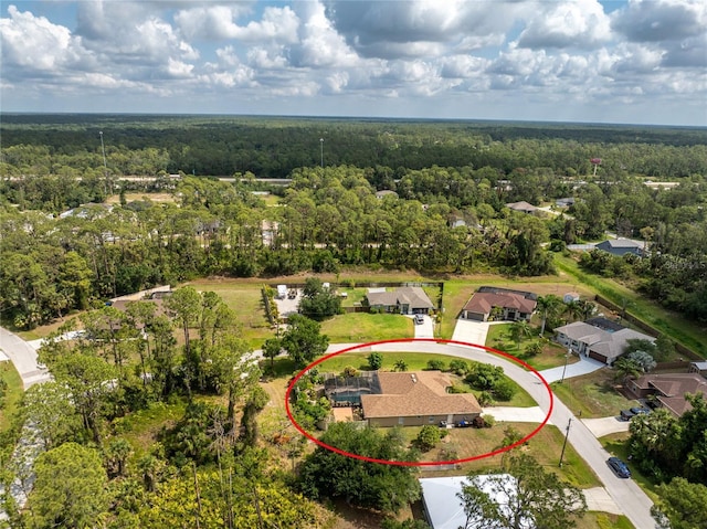 4443 Abcor Rd, North Port, FL 34286 - aerial perspective of suburban area with a forest