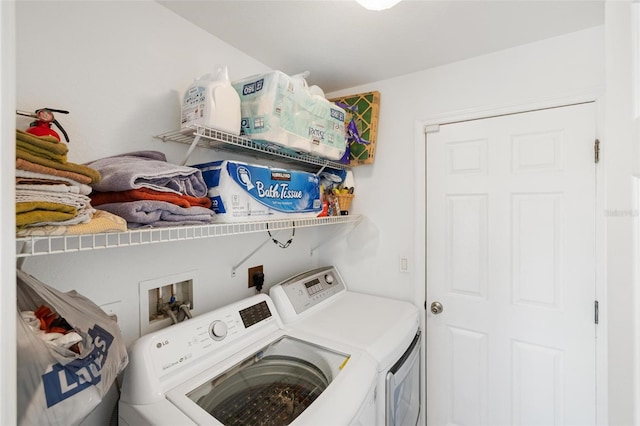 3886 Cincinnati St, North Port, FL 34286 - laundry area featuring washer and dryer