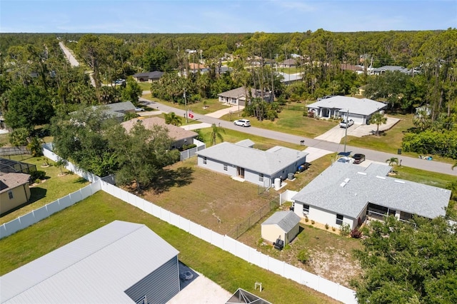 3886 Cincinnati St, North Port, FL 34286 - aerial perspective of suburban area with a forest