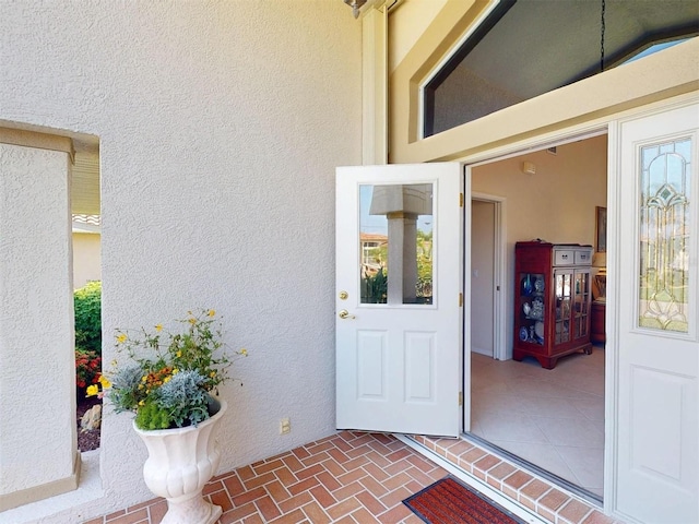 3518 Terin Ct, Punta Gorda, FL 33950 - view of exterior entry featuring stucco siding