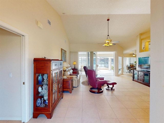 3518 Terin Ct, Punta Gorda, FL 33950 - living area featuring ceiling fan, tile patterned floors, and high vaulted ceiling