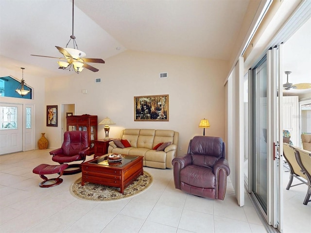 3518 Terin Ct, Punta Gorda, FL 33950 - living room featuring ceiling fan, light tile patterned flooring, and high vaulted ceiling
