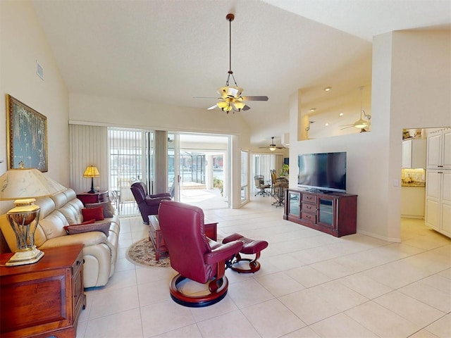 3518 Terin Ct, Punta Gorda, FL 33950 - living area featuring a ceiling fan, light tile patterned floors, baseboards, and high vaulted ceiling