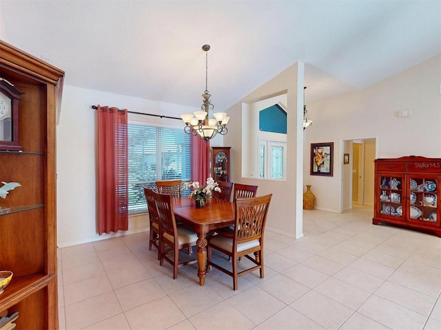 3518 Terin Ct, Punta Gorda, FL 33950 - dining room featuring a chandelier, lofted ceiling, light tile patterned floors, and baseboards
