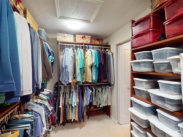 3518 Terin Ct, Punta Gorda, FL 33950 - walk in closet with attic access and tile patterned floors
