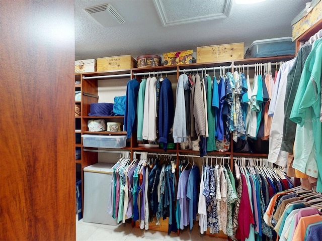 3518 Terin Ct, Punta Gorda, FL 33950 - walk in closet with attic access and tile patterned floors