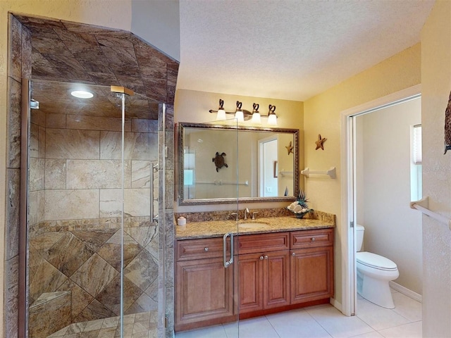 3518 Terin Ct, Punta Gorda, FL 33950 - full bathroom featuring vanity, a shower stall, toilet, tile patterned flooring, and a textured ceiling