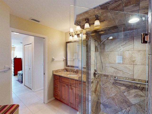 3518 Terin Ct, Punta Gorda, FL 33950 - bathroom featuring vanity, a stall shower, and tile patterned flooring