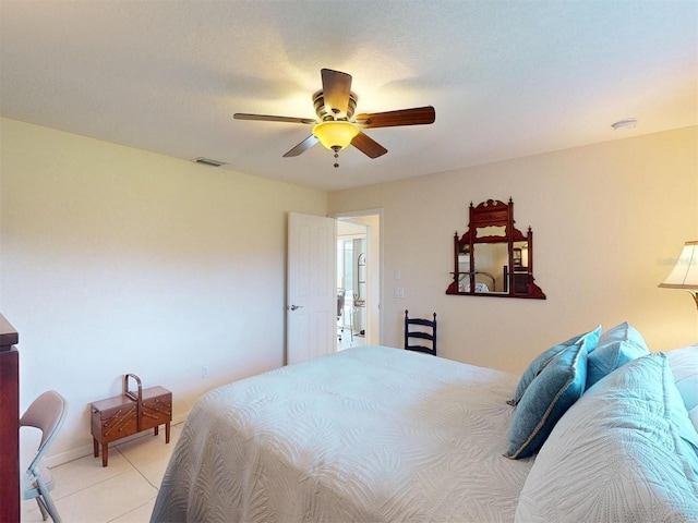 3518 Terin Ct, Punta Gorda, FL 33950 - bedroom featuring light tile patterned flooring, a ceiling fan, and baseboards