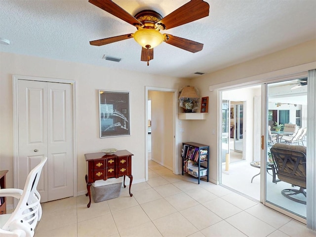 3518 Terin Ct, Punta Gorda, FL 33950 - office featuring a ceiling fan, a textured ceiling, baseboards, and light tile patterned flooring