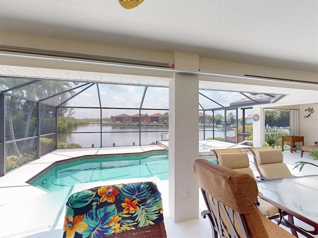 3518 Terin Ct, Punta Gorda, FL 33950 - outdoor pool featuring a water view, glass enclosure, and a patio