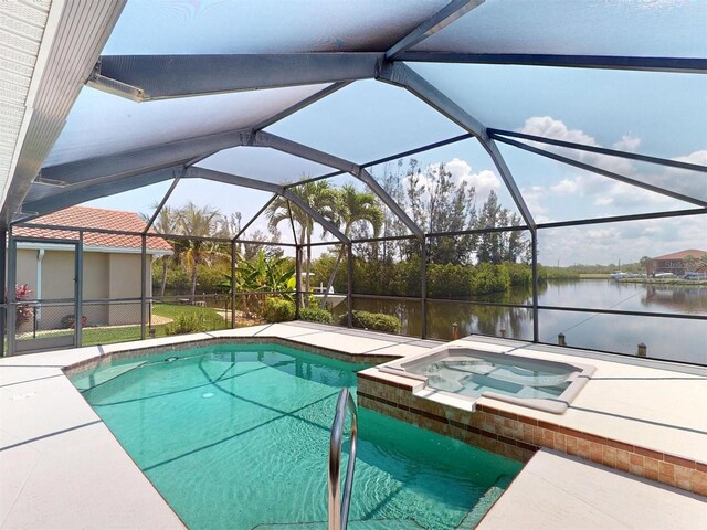 3518 Terin Ct, Punta Gorda, FL 33950 - swimming pool with a water view, an in-ground hot tub, a patio area, and glass enclosure