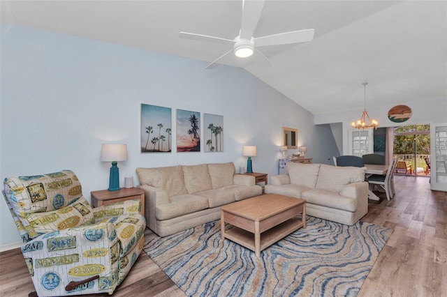206 Gondola Park Dr Unit 206, Venice, FL 34292 - living area with a chandelier, wood finished floors, lofted ceiling, and ceiling fan