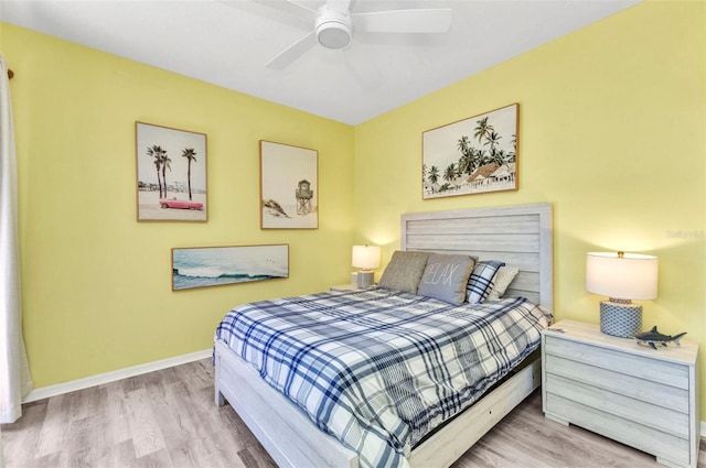 206 Gondola Park Dr Unit 206, Venice, FL 34292 - bedroom with wood finished floors, baseboards, and a ceiling fan