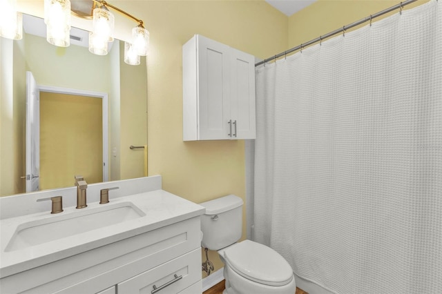 206 Gondola Park Dr Unit 206, Venice, FL 34292 - bathroom featuring vanity, toilet, and a shower with shower curtain