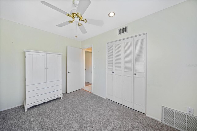 1596 Hayworth Rd, Port Charlotte, FL 33952 - unfurnished bedroom featuring carpet, baseboards, ceiling fan, and a closet