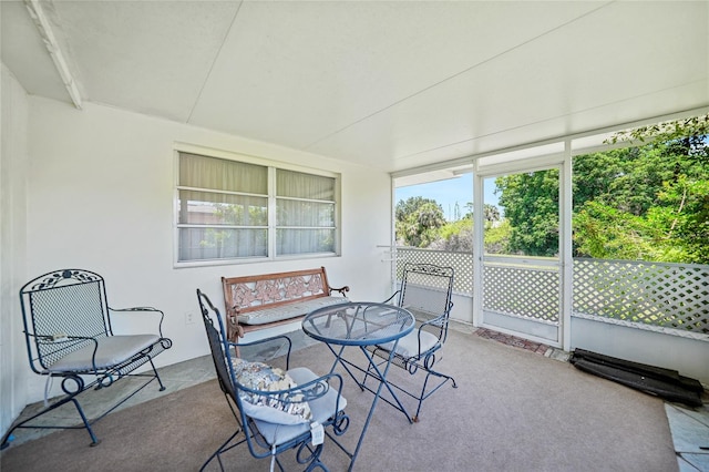 1596 Hayworth Rd, Port Charlotte, FL 33952 - sunroom / solarium featuring outdoor dining space