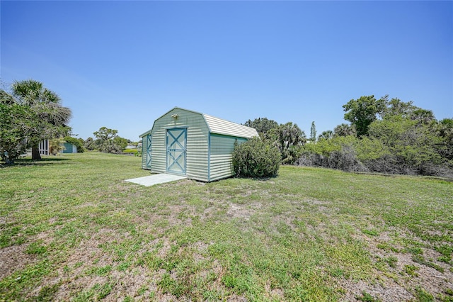 1596 Hayworth Rd, Port Charlotte, FL 33952 - view of grassy yard featuring a storage shed and an outbuilding