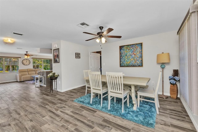 2626 Auburn Blvd, Port Charlotte, FL 33948 - dining space featuring a ceiling fan, wood finished floors, and baseboards