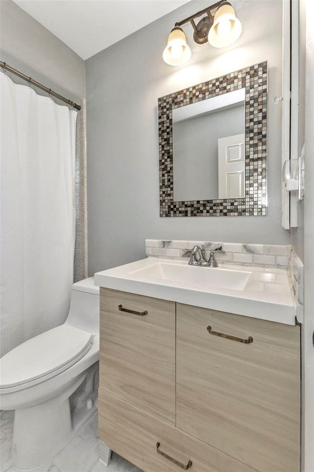 2626 Auburn Blvd, Port Charlotte, FL 33948 - full bath with marble finish floors, vanity, toilet, and a shower with curtain