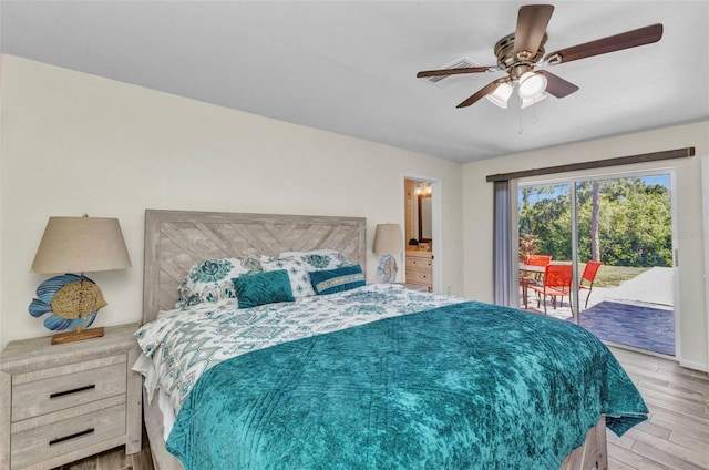 2626 Auburn Blvd, Port Charlotte, FL 33948 - bedroom with access to outside, wood finished floors, and ceiling fan