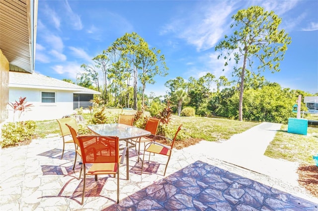 2626 Auburn Blvd, Port Charlotte, FL 33948 - view of patio / terrace featuring outdoor dining space