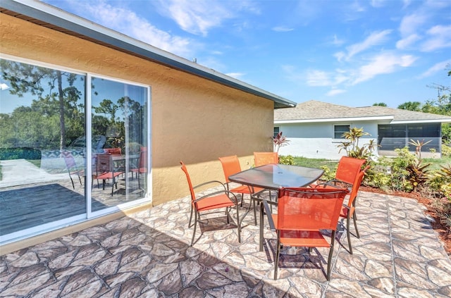 2626 Auburn Blvd, Port Charlotte, FL 33948 - view of patio featuring outdoor dining area