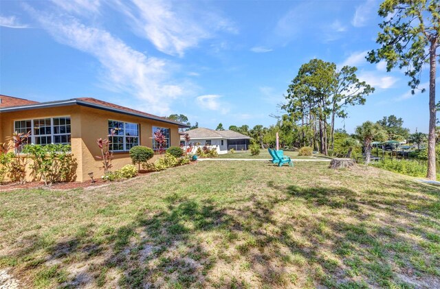 2626 Auburn Blvd, Port Charlotte, FL 33948 - view of grassy yard