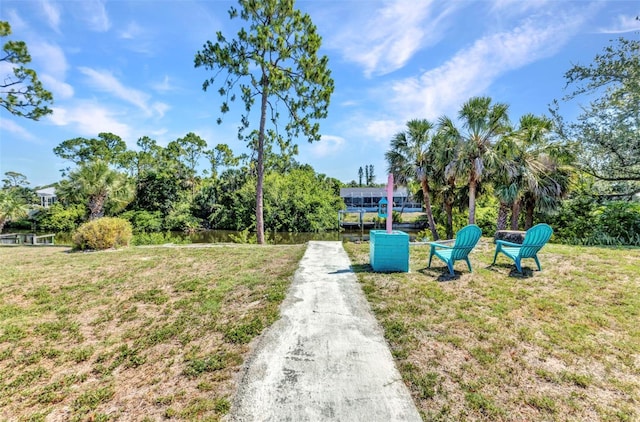 2626 Auburn Blvd, Port Charlotte, FL 33948 - view of home's community featuring a yard