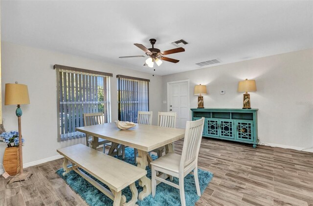2626 Auburn Blvd, Port Charlotte, FL 33948 - dining area featuring ceiling fan and light wood-type flooring