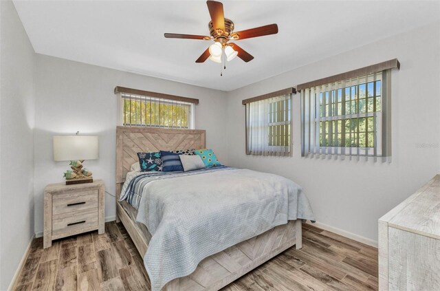 2626 Auburn Blvd, Port Charlotte, FL 33948 - bedroom with wood finished floors and ceiling fan