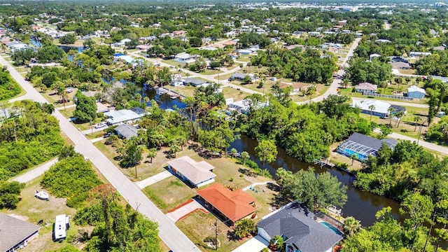 2626 Auburn Blvd, Port Charlotte, FL 33948 - aerial perspective of suburban area with a nearby body of water