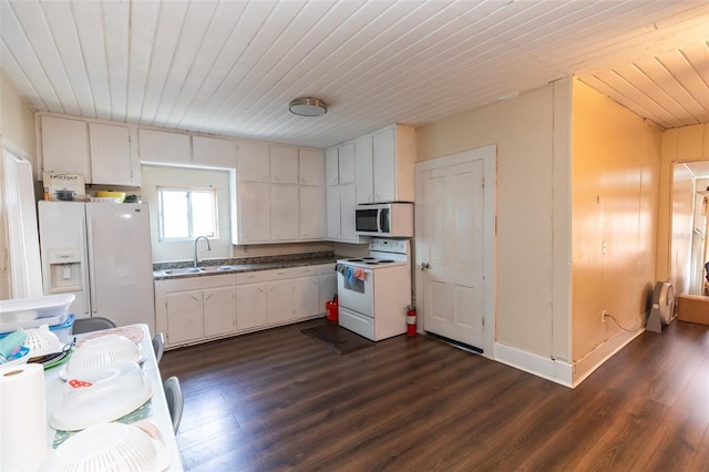 114 N Dade Ave, Arcadia, FL 34266 - kitchen featuring white appliances, a sink, wood ceiling, dark wood-style floors, and dark countertops