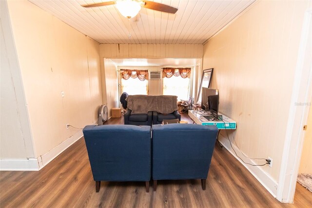 114 N Dade Ave, Arcadia, FL 34266 - living room featuring a ceiling fan, wood finished floors, wooden ceiling, baseboards, and wooden walls