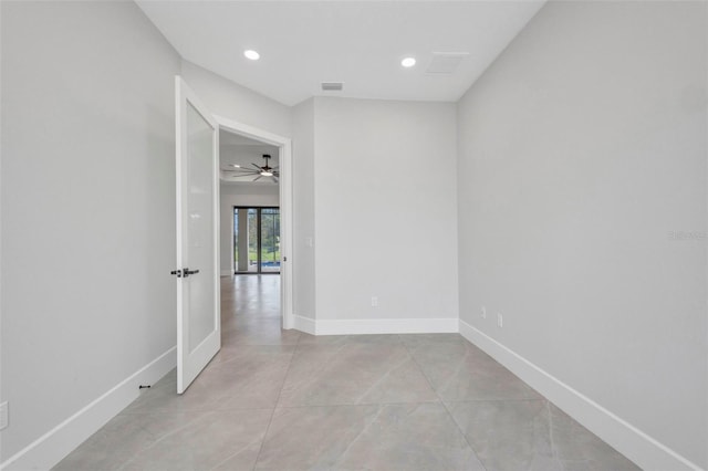 15 Tournament Rd, Rotonda West, FL 33947 - empty room with ceiling fan, recessed lighting, and light tile patterned floors