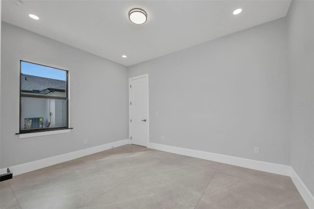 15 Tournament Rd, Rotonda West, FL 33947 - unfurnished room with recessed lighting