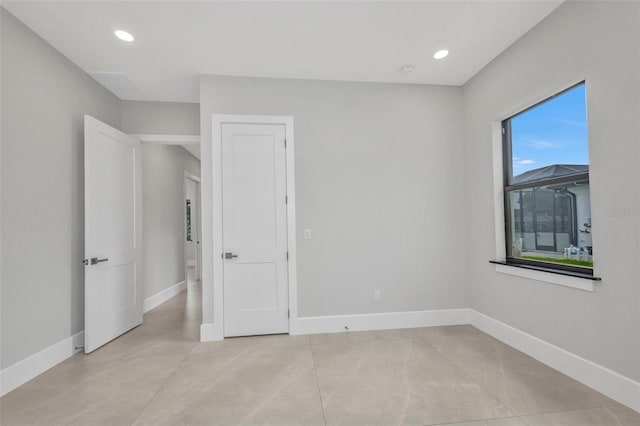 15 Tournament Rd, Rotonda West, FL 33947 - spare room featuring recessed lighting