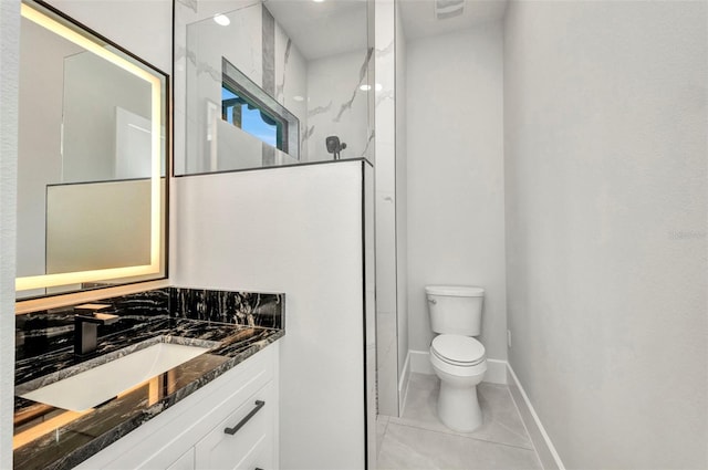 15 Tournament Rd, Rotonda West, FL 33947 - bathroom featuring vanity, a walk in shower, and tile patterned flooring