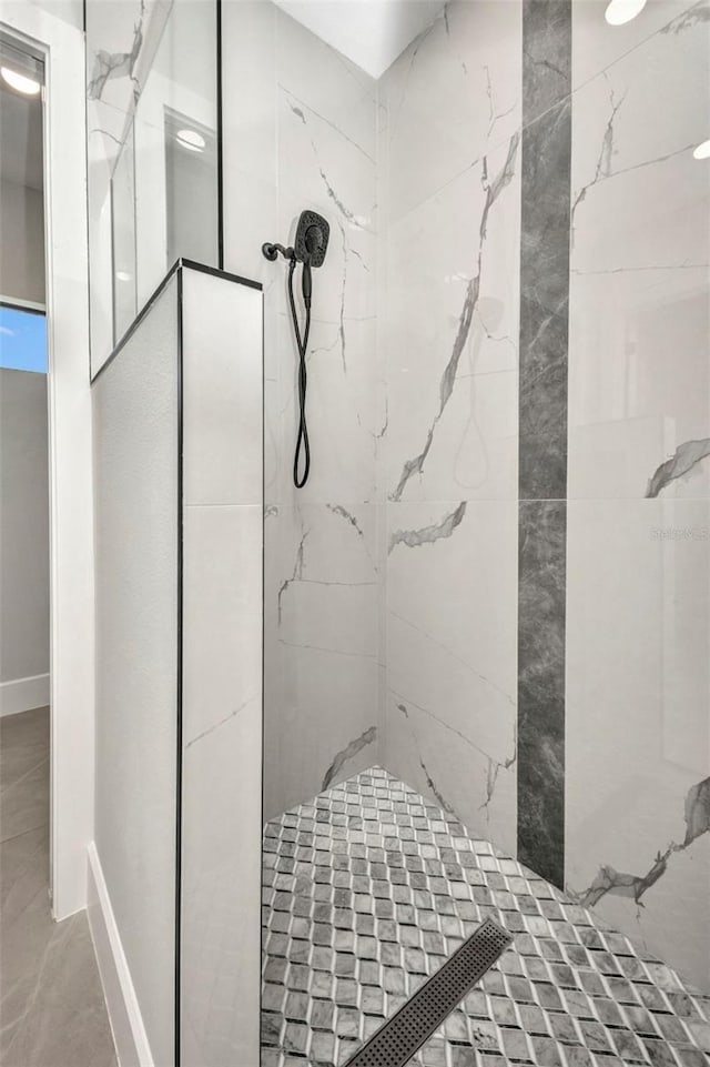 15 Tournament Rd, Rotonda West, FL 33947 - full bath with a marble finish shower and baseboards