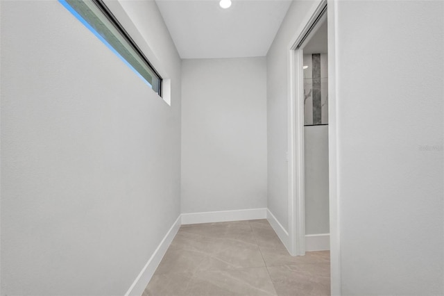 15 Tournament Rd, Rotonda West, FL 33947 - corridor with baseboards and recessed lighting