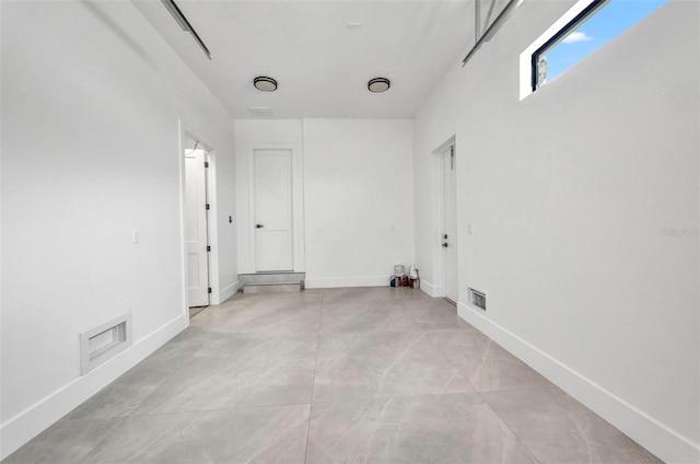 15 Tournament Rd, Rotonda West, FL 33947 - spare room with baseboards