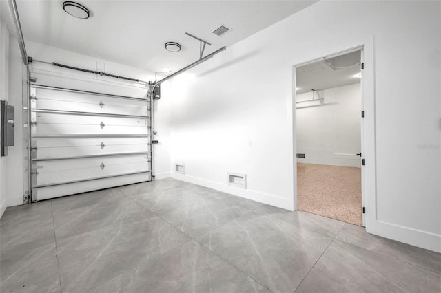 15 Tournament Rd, Rotonda West, FL 33947 - garage featuring electric panel and baseboards