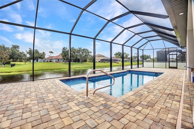 15 Tournament Rd, Rotonda West, FL 33947 - outdoor pool with a patio area, a lawn, and glass enclosure